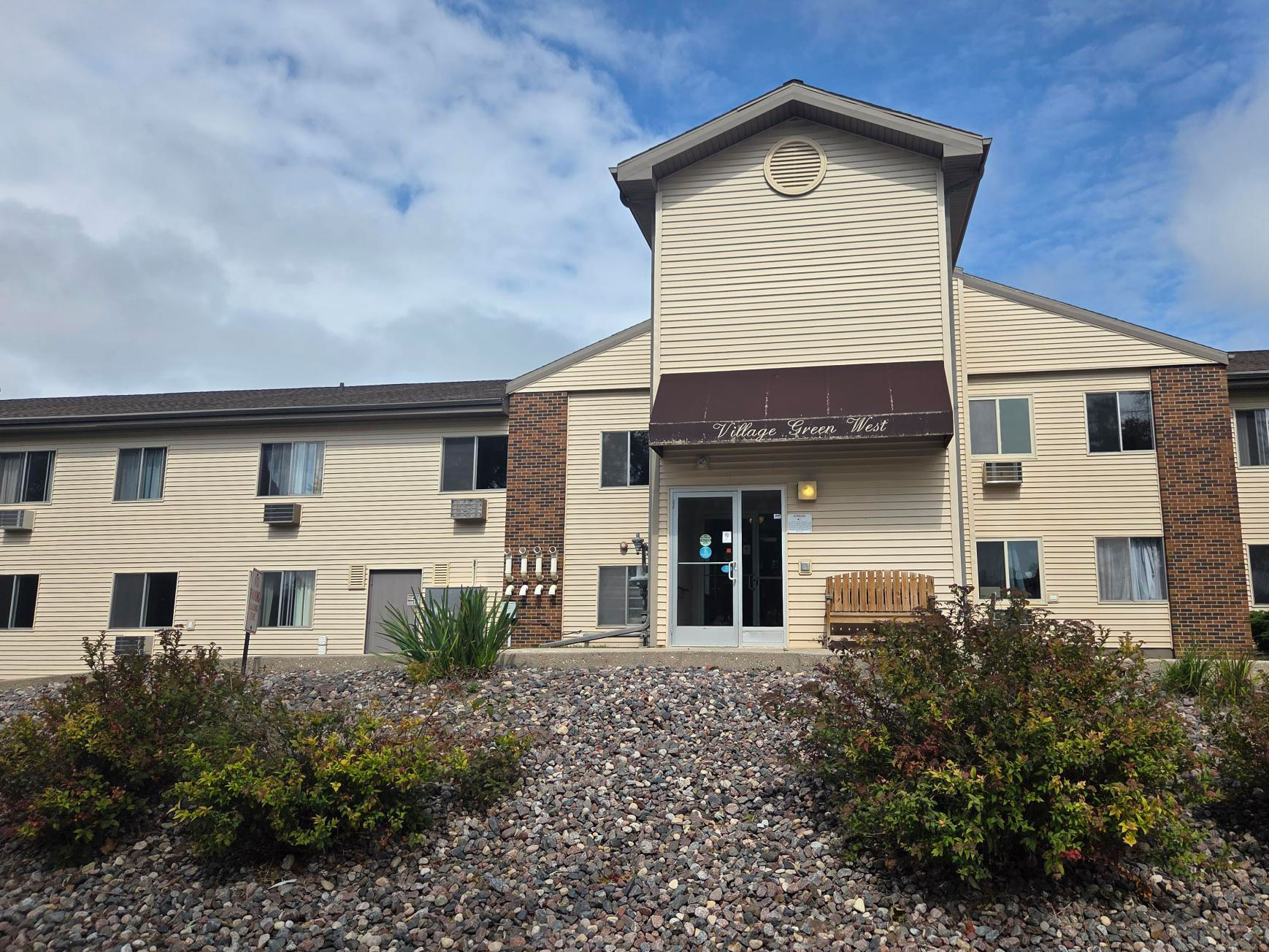 The entrance of Village green west apartments in Two Rivers WI